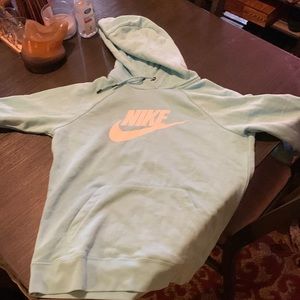 i am selling a hoodie with a Nike sign on the front of it it’s is real Nike
